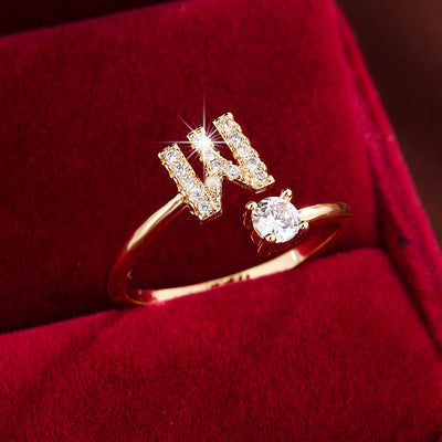 Bague initiale personnalisée en zircons scintillants