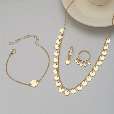 Parure collier, bracelet et 2 bagues en or 18K avec pendentifs dorés