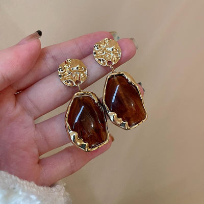 Boucles d’oreilles faites main avec une grande pierre de lune