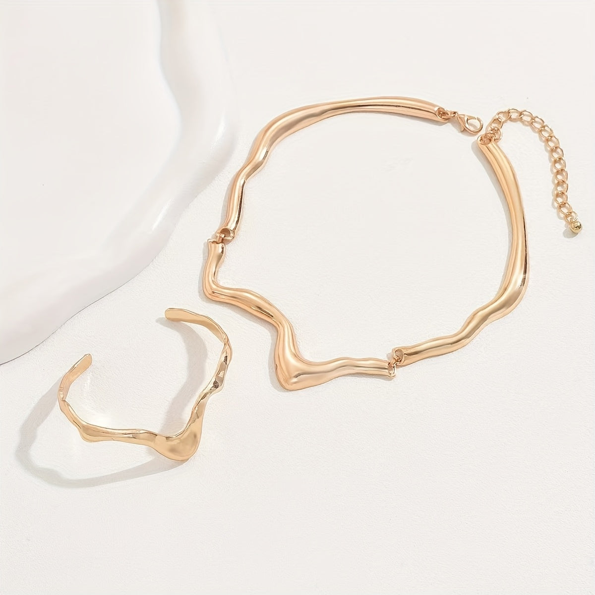 Parure collier et bracelet en or 18K au design lave