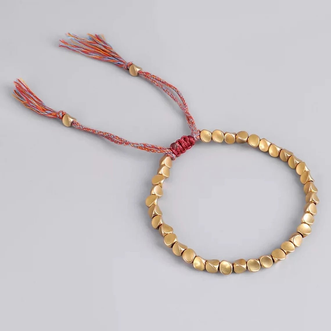 Bracelet tibétain porte-bonheur en cuivre – Énergie et prospérité