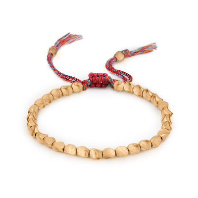 Bracelet tibétain porte-bonheur en cuivre – Énergie et prospérité