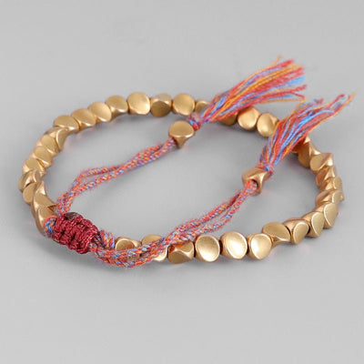 Bracelet tibétain porte-bonheur en cuivre – Énergie et prospérité