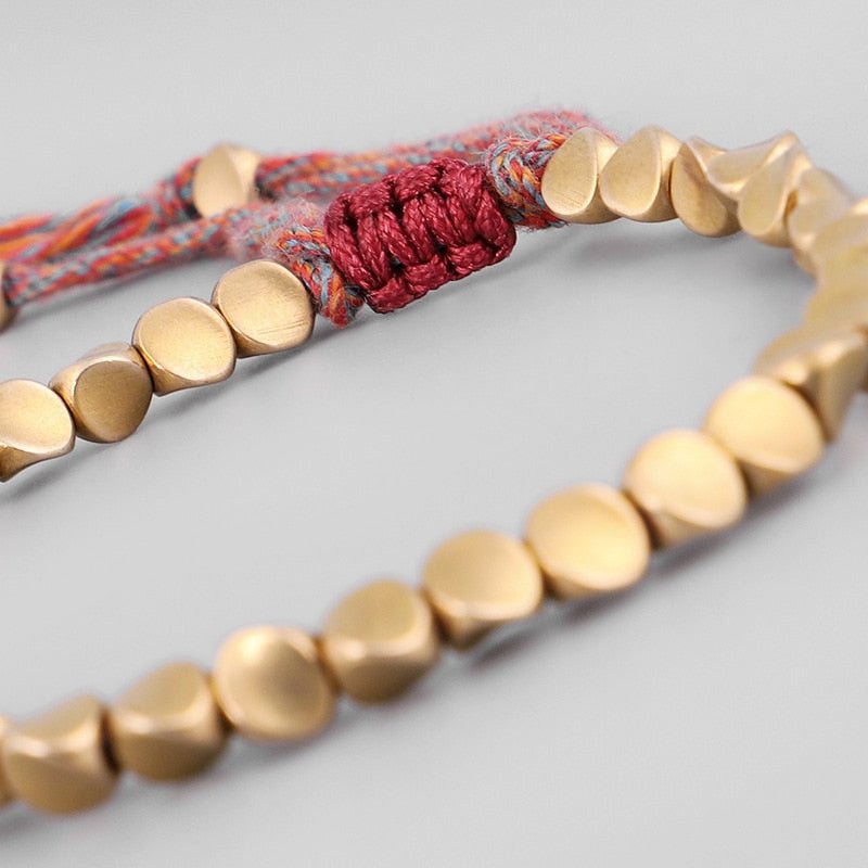 Bracelet tibétain porte-bonheur en cuivre – Énergie et prospérité