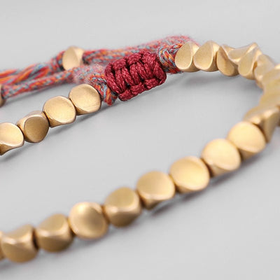 Bracelet tibétain porte-bonheur en cuivre – Énergie et prospérité